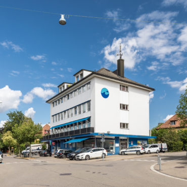 Sanierung und Dachstockausbau Mehrfamilienhaus
